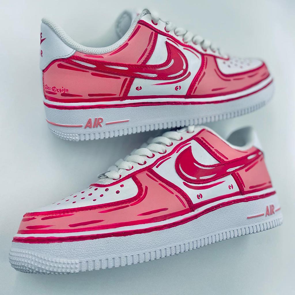 Customized Nike Air Force 1 sneakers with a cartoon style design in pink and white.