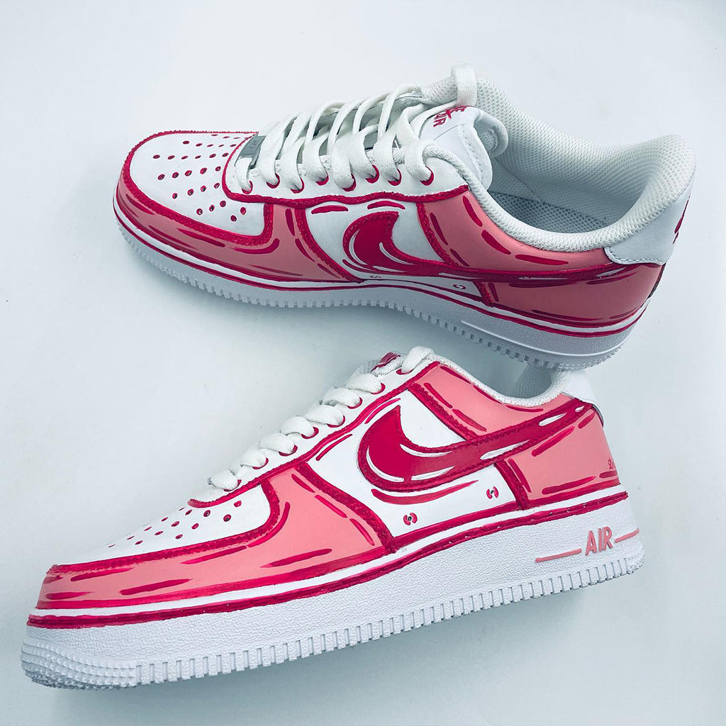 Customized Nike Air Force 1 sneakers with a cartoon style design in pink and white.