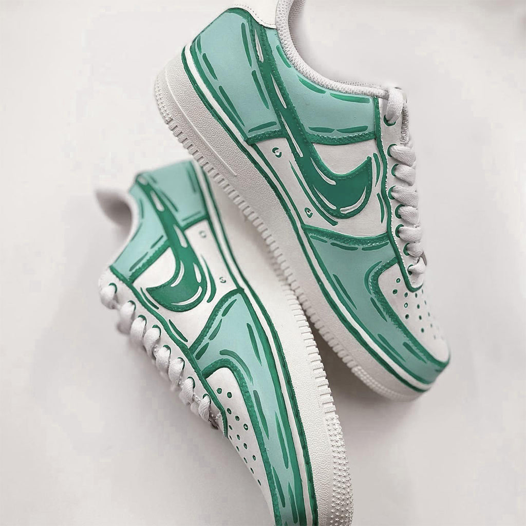Customized Nike Air Force 1 sneakers with a cartoon style design in green and white.